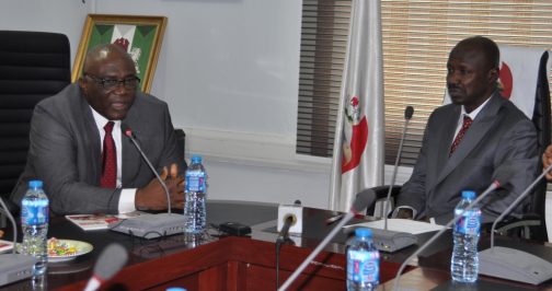 NAN MD, Mr. Bayo Onanuga (left) discussing with the acting Chairman of the EFCC, Ibrahim Magu
