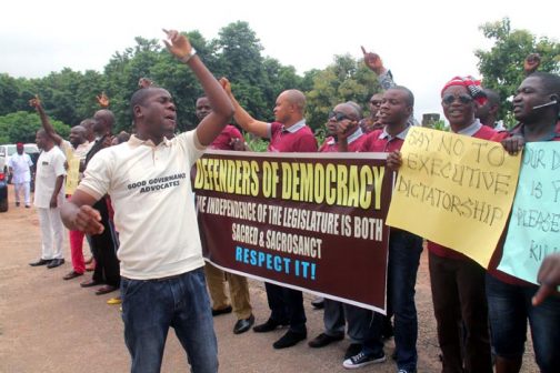 Supporters of Senate President Bukola Saraki at the premises of the FCT High Court on Monday