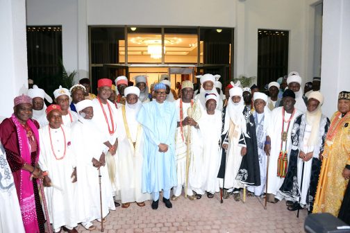 President Muhammadu Buhari (M) in a  group photograph with the traditional rulers 