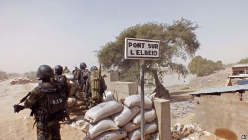  Cameroon soldiers stand guard at a lookout post near the village of Fotokol as they take part in operations against the Islamic extremists group Boko Haram
