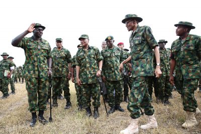 President Muhammadu Buhari interacting with the troops