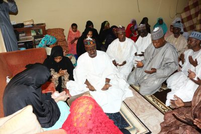 National Security Adviser to the President, Major General Babagana Monguno, FCT Minister, Alhaji Mohammed Bello, Minister of Education, Mallam Adamu Adamu, Governor of Borno State, Alhaji Ibrahim Shettima and SSAP Mallam Garba Shehu praying at the residence of the deceased during the visit