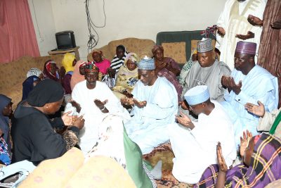 National Security Adviser to the President, Major General Babagana Monguno, FCT Minister, Alhaji Mohammed Bello, Minister of Education Mallam Adamu Adamu, Governor of Borno State, Alhaji Ibrahim Shettima and SSAP Mallam Garba Shehu praying at the residence of the deceased
