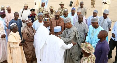 National Security Adviser to the President, Major General Babagana Monguno and other members of the Federal Government delegation being received by the Governor of Borno State, Alhaji Ibrahim Shettima