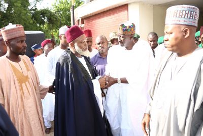  National Security Adviser to the President, Major General Babagana Monguno, in a hand shake with the Chief Imam of Bornu, Asil Ibn Adam AL-Sanusi and Governor of Borno State, Al]haji Ibrahim Shettima during the visit