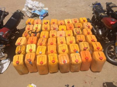 Gallons of fuel and motorcycles seized from the fleeing Boko Haram suspects