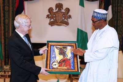 President Buhari presenting a parting gift to the outgoing German Ambassador, H.E. Michael Zenner, during a farewell audience at the State House on 21 July, 2016
