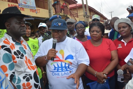Dr. Adejare addressing residents of Alimosho during the sanitation exercise.