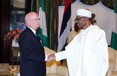 R-L;  President Muhammadu Buhari in a hand shake with the outgoing United States Ambassador to Nigeria, Mr James F. Entwistle  during a farewell audience with the President at the State House in Abuja.