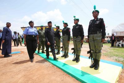 Ondo State Commissioner of Police, Mrs. Hilda Ibifuro-Harrison, leads the Vice President, Prof. Yemi Osinbajo SAN as he inspects a guard of honour mounted by The Nigeria Police Force at the new Police Divisional Headquarters Ilara-Mokin. 