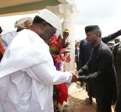 Vice President Yemi Osinbajo greeting one of his hosts 