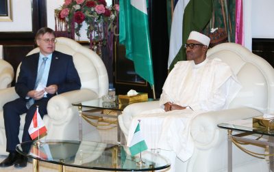 R-L: President Muhammadu Buhari and Canadian High Commissioner to Nigeria, Mr Perry John Calderwood during a farewell audience with the President at the State House in Abuja.