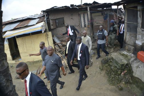 Rivers State Governor, Nyesom Ezenwo Wike  and security agents at the hideout of suspected cultists at  Eagle Island, Port Harcourt on Saturday.  