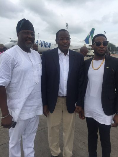 Senator Melaye on arrival in Lagos at the airport with popular musician, D banj (right)