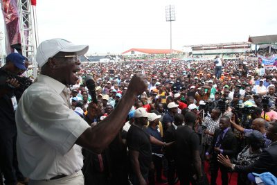 Governor Adams Oshiomhole addresses teeming supporters of the All Progressives Congress at the flag-off of the gubernatorial campaign of the All Progressives Congress for the September 10 election in the state, at the Samuel Ogbemudia Stadium, Benin City, on Saturday.