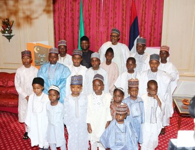 President Muhammadu Buhari with  Vice President Prof Yemi Osinbajo and cross section of children during Sallah homage at his residence in Abuja. 