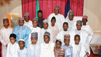 President Muhammadu Buhari with  Vice President Prof Yemi Osinbajo and cross section of children during Sallah homage at the State House, Abuja