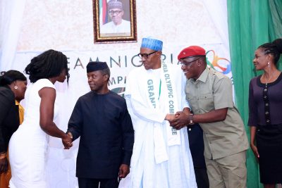 R-L; Nigerian International Sprinter, Mrs. Mary Onyali-Omagbemi,  Minister of Youth and Sports, Barrister Solomon Dalung, President Muhammadu Buhari, Vice President Yemi Osinbajo, Nigeria's  International sprint legend, Falilat Ogunkoya during the investiture of the president as the Grand Patron of the Nigerian Olympic Committee at the State House in Abuja.