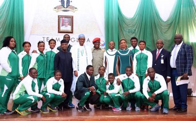 President Muhammadu Buhari (M) flanked by Vice President Yemi Osinbajo, Minister of Youth and Sports, Barrister Solomon Dalung and Team Nigeria for the 2016 Rio Olympic  at the State House in Abuja