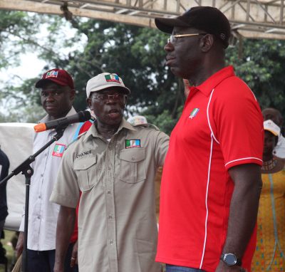 Governor Adams Oshiomhole flanked by Mr Godwin Obaseki, Governorship candidate of the All progressives Congress (APC) (right) and Hon Philip Shaibu, his running mate (left) at a rally of the APC for the forthcoming Governorship election in the state, at Ramat Park, Benin City, Thursday.
