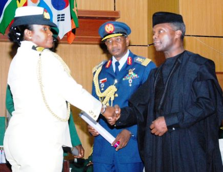 The Vice President, Prof Yemi Osinbajo presents Certificates and Awards to the graduating students at the ceremony