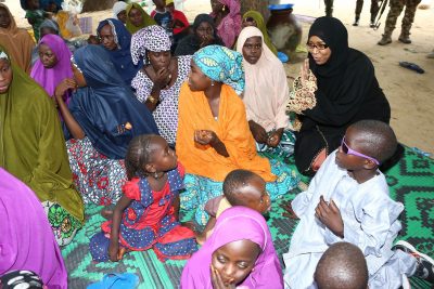  Wife of National Security Adviser, Nafisah Babagana-Monguno (in black) talks with some of the rescued under-age Boko Haram child brides at a safe house in Maiduguri, Borno State.