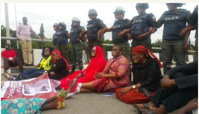 Dr. Oby Ezekwesili and other campaigners on the Aso Rock access road