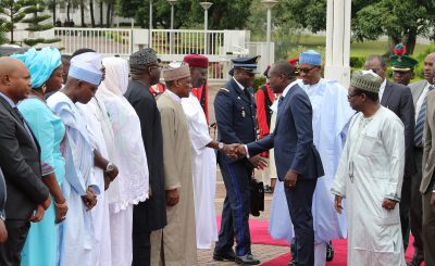 R-L; President Muhammadu Buhari  introduces the Minister of Defence, Brig. Gen. Mansur Dan Ali to Mr. Patrice Talon during the visit