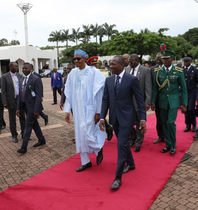 President Muhammadu Buhari receives President Patrice Talon at the State House.