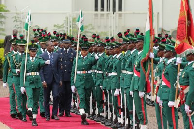 R-L;President Patrice Talon of Benin Republic inspects guards of honour during his official visit to President Muhammadu Buhari at the State House. 