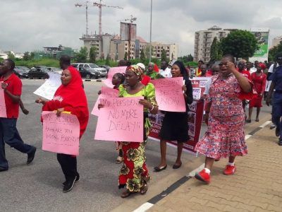 Members of #BringBackOurGirls marching to Aso Rock before they were stopped