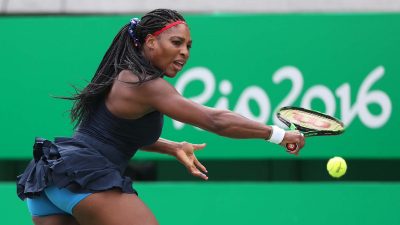 Serena struggling to contain her opponent during the match