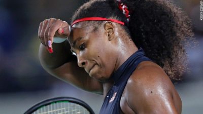 Serena covers her face in shame for the defeat