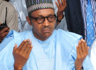 President Muhammadu Buhari praying