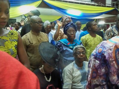 Dr Sola Olorunyomi and his daughter Iwalewa sitting down