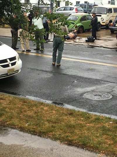 The suspect after he was shot by the police