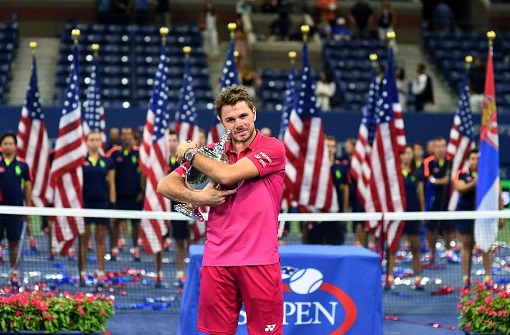 Stan Wawrinka poses with his trophy after defeating Novak Djokovic at the 2016 US Open final on September 11, 2016