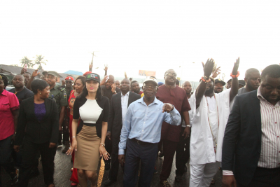 Governor Adams Oshiomhole of Edo State, his wife, Iara, and others on a road show to celebrate APC victory in the governorship election