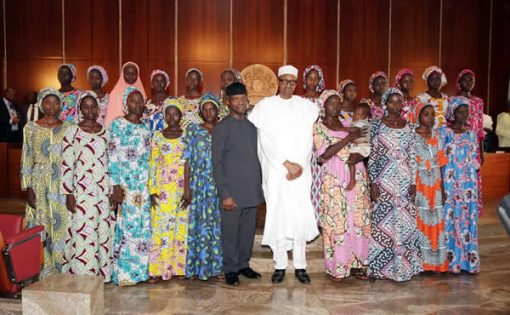 Flashback:President Muhammadu Buhari and Vice President Yemi Osinbajo with some of the rescued Chibok schoolgirls at the Presidential Villa in 2016