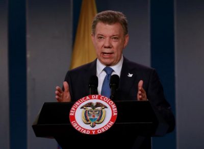 Colombia’s President Santos talks during a news conference after a meeting with Colombian former President and Senator Uribe at Narino Palace in Bogota