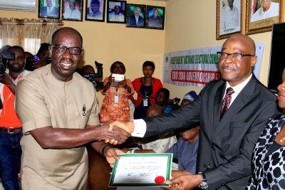 Obaseki receiving his certificate as winner of the Edo election