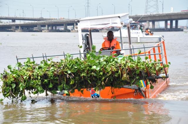 The Water Hyacinth Removal Machine in action