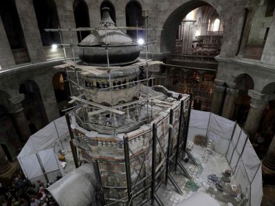 Greek preservation experts work to strengthen the Adicule surrounding the Tomb of Jesus, where his body is believed to have been laid, as part of conservation work done by the Greek team in Jerusalem
