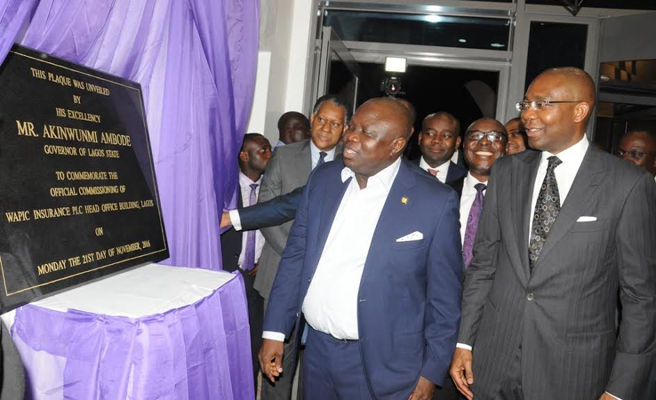 Lagos State Governor, Mr. Akinwunmi Ambode (middle), with the Chairman, Board of Directors, Wapic Insurance Plc., Mr. Aigboje Aig-Imoukhuede (right) and former Minister of Foreign Affairs, Mr. Odein Ajumogobia (left) during the commissioning of Wapic Insurance Plc. Head Office at Ikoyi, on Monday.