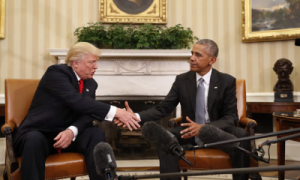 Unhappy President Barack Obama shakes Donald Trump, President-elect