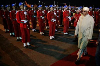 President Muhammadu Buhari inspecting a guard of honour mounted by Moroccan troops