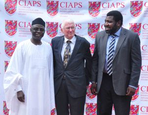 Chief Joop Berkhout, Safari Books, with Pastor Tunde Bakare, left, and Kila, right