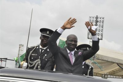 Obaseki waving to the crowd after his swearing in as Governor of Edo State