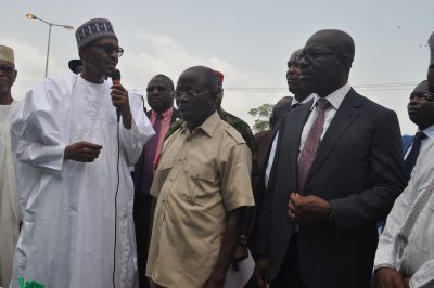 From left: President Muhammadu Buhari, Governor Adams Oshiomhole and Mr Godwin Obaseki, Governor-elect during the commissioning of the 6-lane Upper Siluko road in Benin City, on Monday.