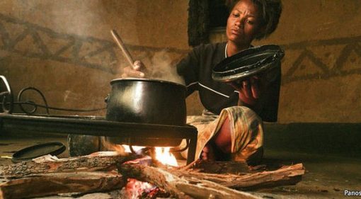 Woman cooking with Firewood